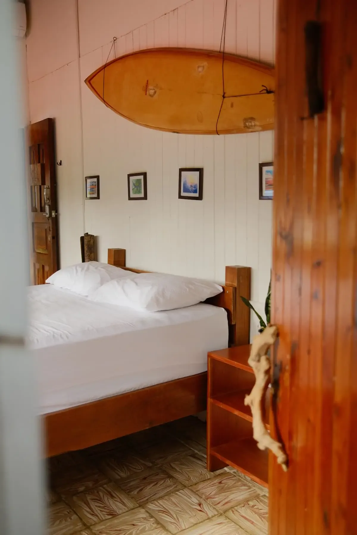 Private room at Pavones Surf Camp with air conditioning, simple and comfortable